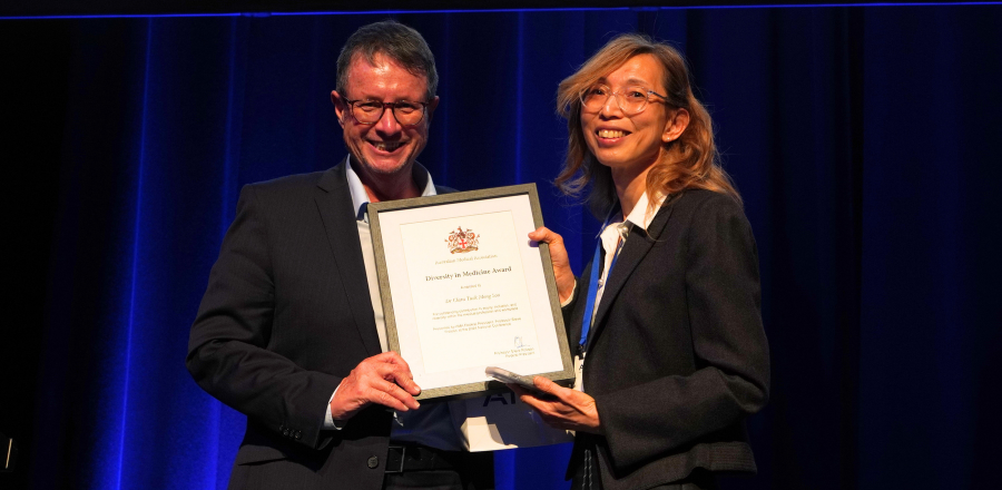 AMA President Professor Stephen Robson presenting the award to Dr Clara Tuck Meng Soo