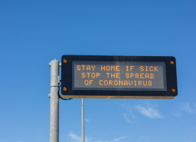 COVID-19 public health road sign