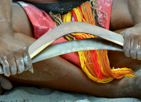 Indigenous man with boomerang