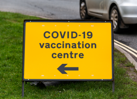 Traffic sign to COVID-19 vaccination centre 