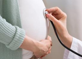 pregnant belly and stethoscope