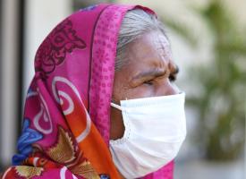 Elderly Indian woman wearing a mask