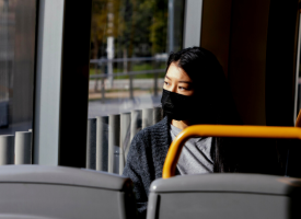Person with mask on transport