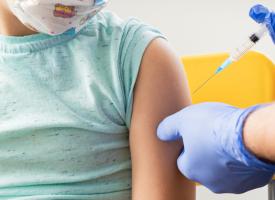 child getting vaccine