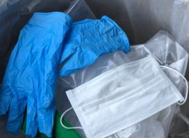 Image of discarded medical masks and gloves