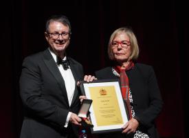 AMA President Professor Steve Robson presenting the award to Professor Caroline de Costa