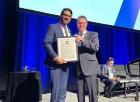 Professor Stephen Robson presenting the AMA Women's Health Award to Dr Keeth Mayakaduwage