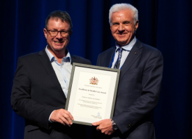 AMA President Professor Steve Robson presenting the award to Professor André Van Zundert