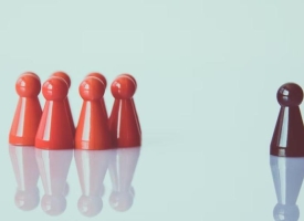 images of red and one black chess piece