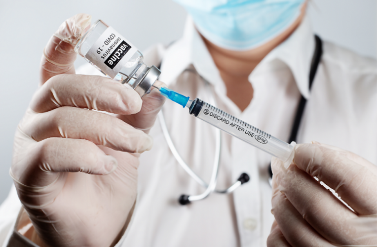 Doctor preparing vaccine