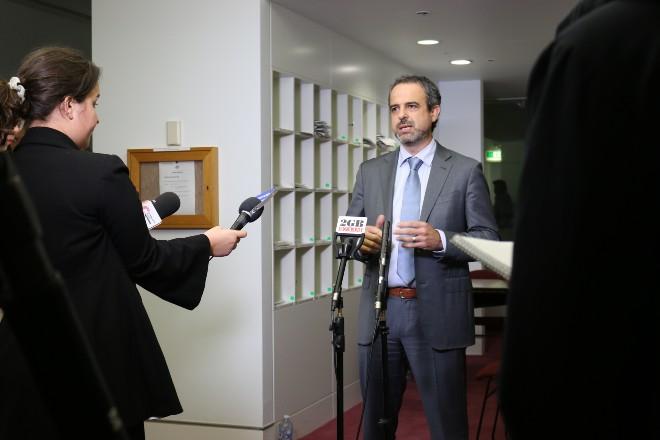 Omar with media on budget night