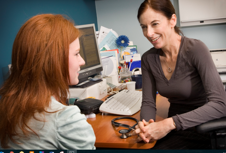 A GP meets with a patient