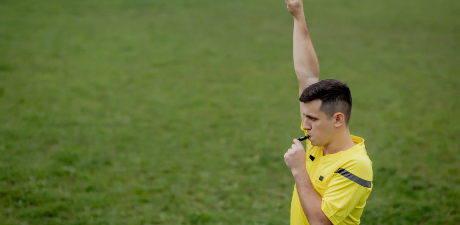 Referee on soccer field