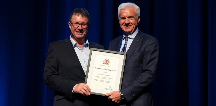 AMA President Professor Steve Robson presenting the award to Professor André Van Zundert